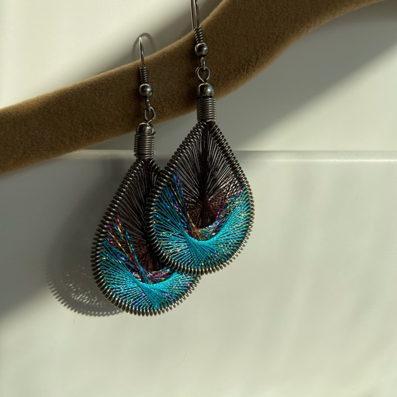 Charming Charlie Jewelry - Charming Charlie turquoise yarn drop earrings
